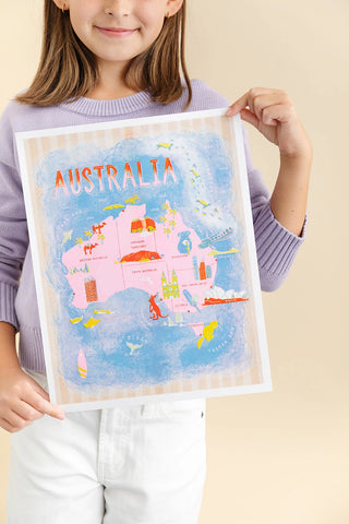 Girl holding a Map of Australia