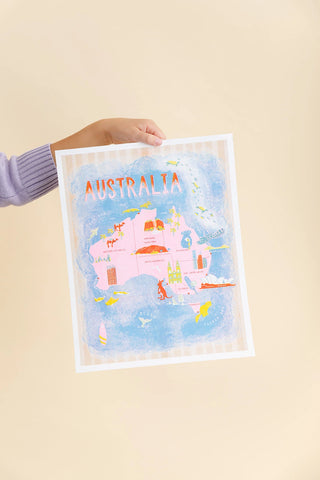 Hand holding a Map of Australia